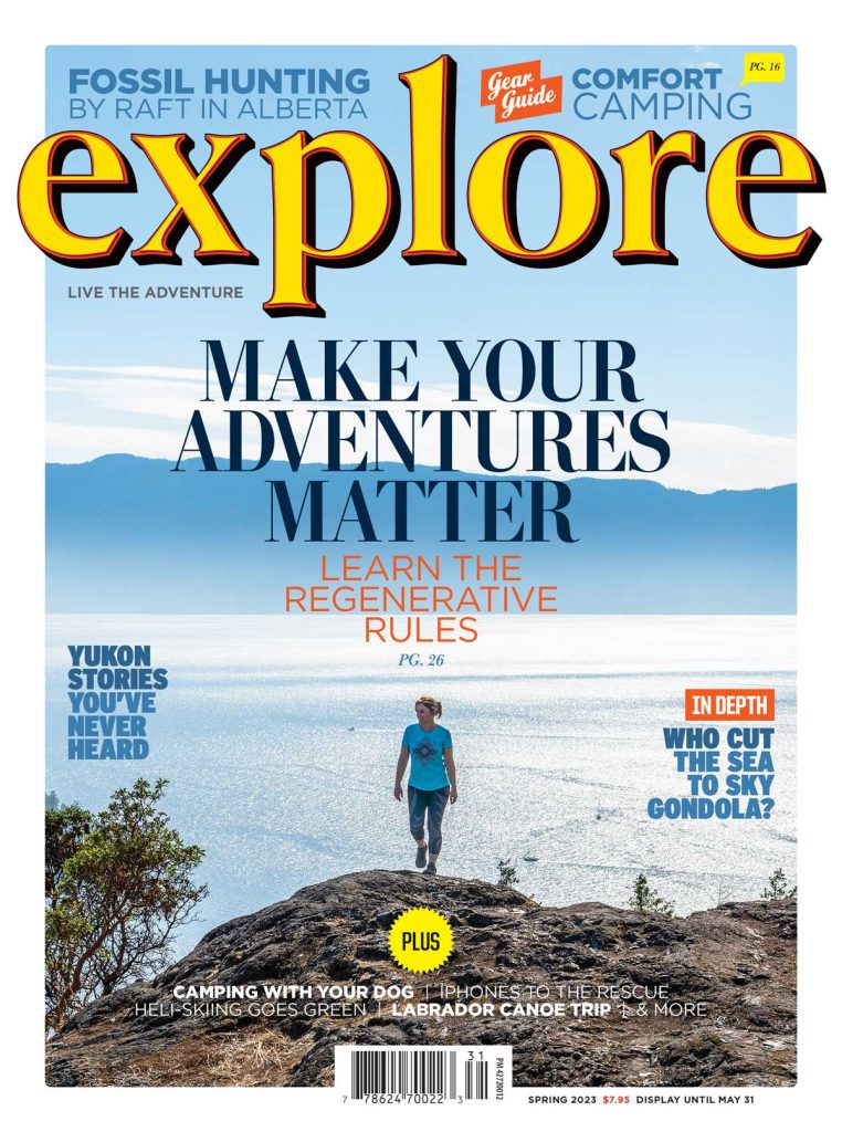 Une couverture d’Explore Magazine avec une femme marchant sur la côte avec les mots, «&nbsp;Make your adventures matter&nbsp;» écrit le long du haut.